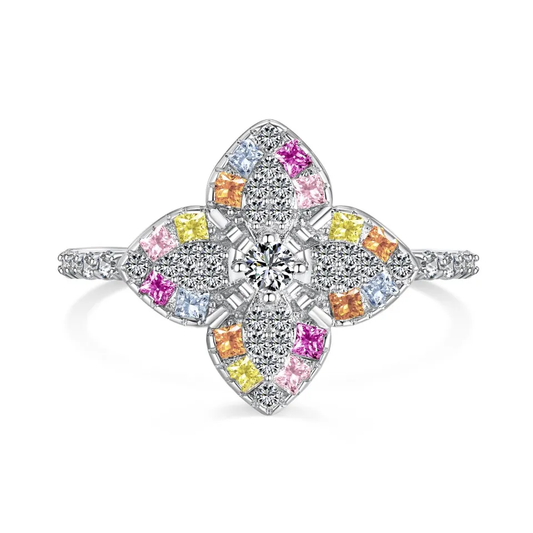 925 silver, rhodium plated ring with a zirkonia studded band and a large pastel-colored zirkonia studded clover. 
