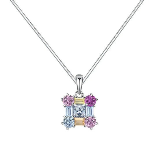 925 silver, rhodium-plated ring with a square pendant that is hand-inlaid with pastel-colored zirkonia. 