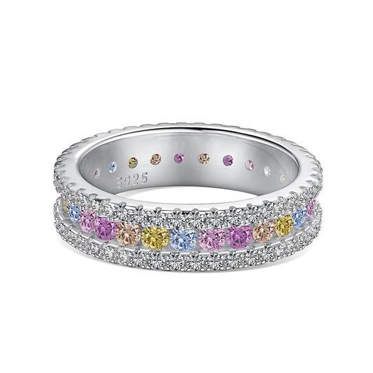 925 Silver, rhodium-plated band ring that is hand-inlaid with pastel colored zirkonia. 