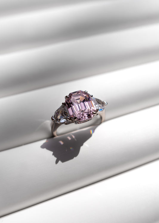925 silver ring with rose colored gemstone shaped like a petal. 